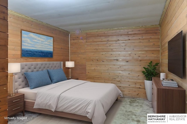 bedroom featuring wood walls