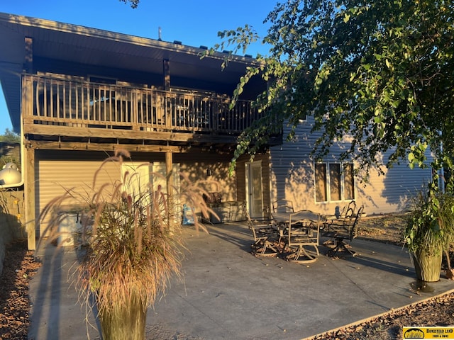 rear view of house featuring a patio