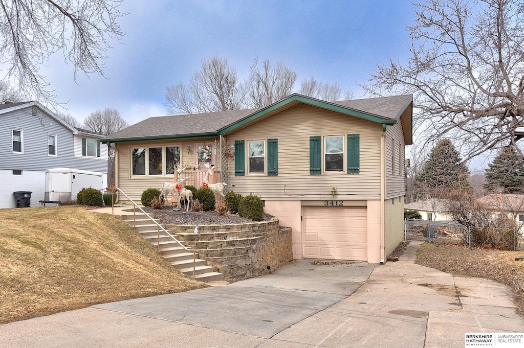 view of front of property with a garage