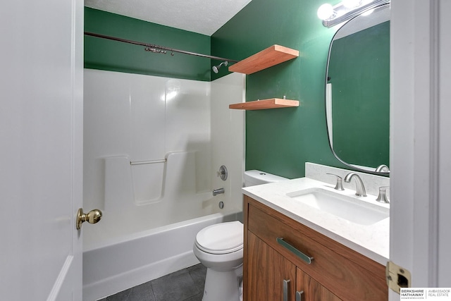 full bathroom featuring tile patterned flooring, toilet, vanity, a textured ceiling, and shower / bathtub combination