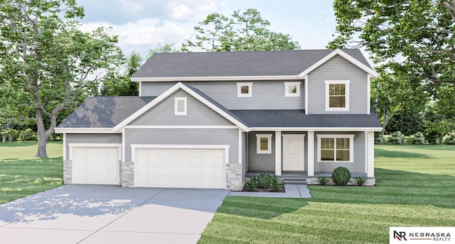 view of front of home featuring a front lawn and a garage