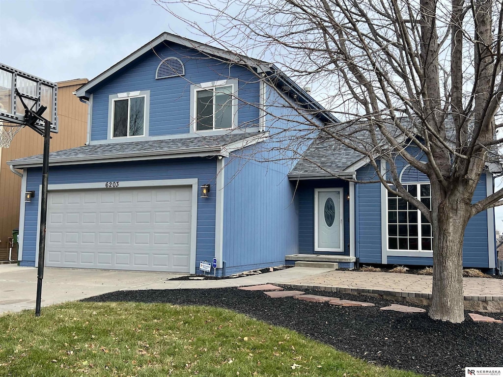 view of front property with a garage