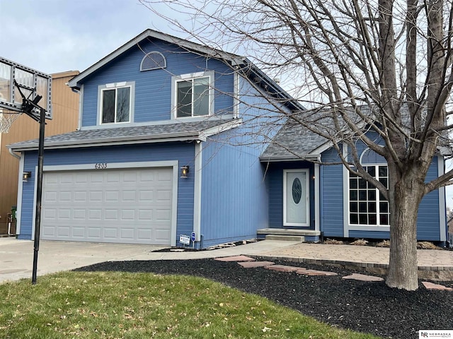 view of front property with a garage