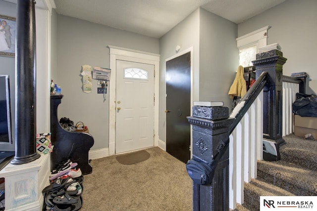 view of carpeted entryway