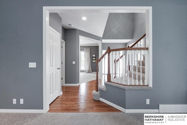 entrance foyer with light carpet