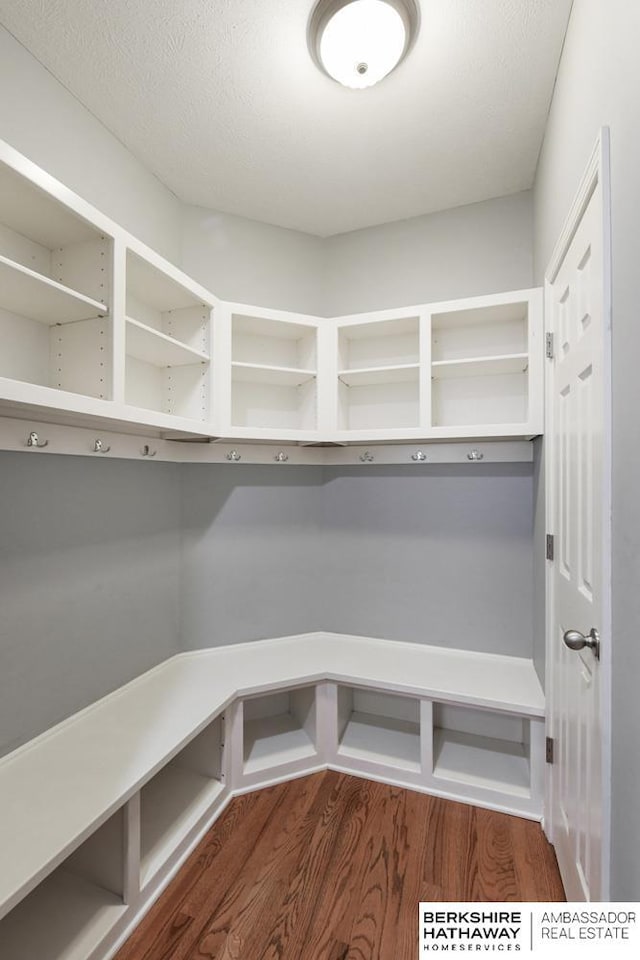 mudroom with hardwood / wood-style floors