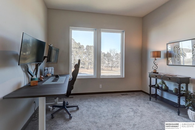 office area with plenty of natural light and carpet