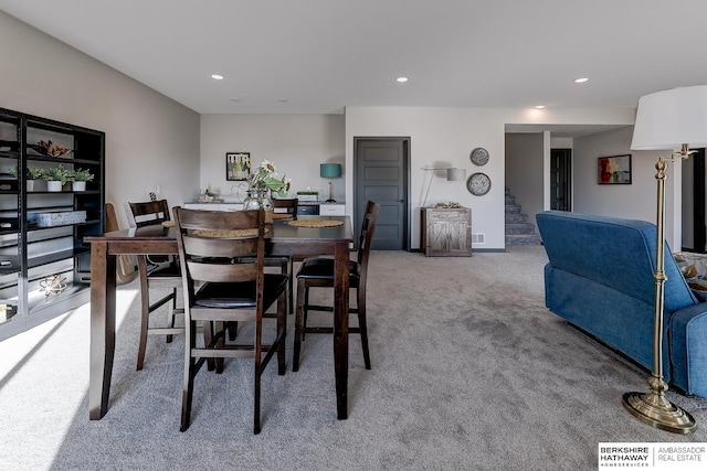 dining area with carpet flooring