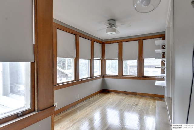 interior space featuring ceiling fan