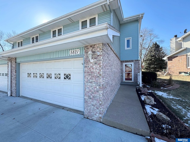 front of property with a garage