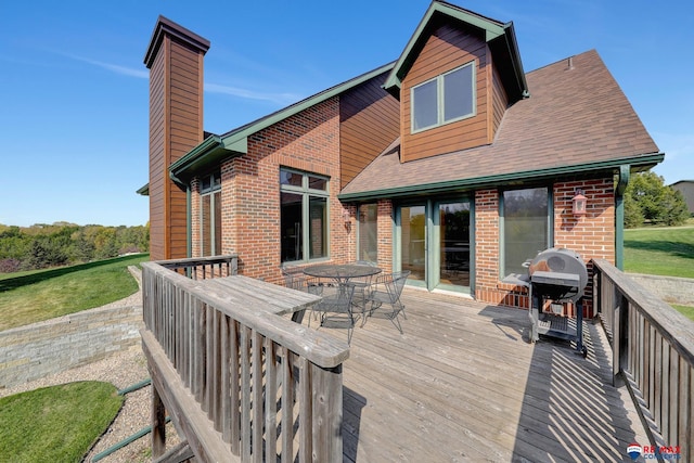 wooden deck featuring grilling area