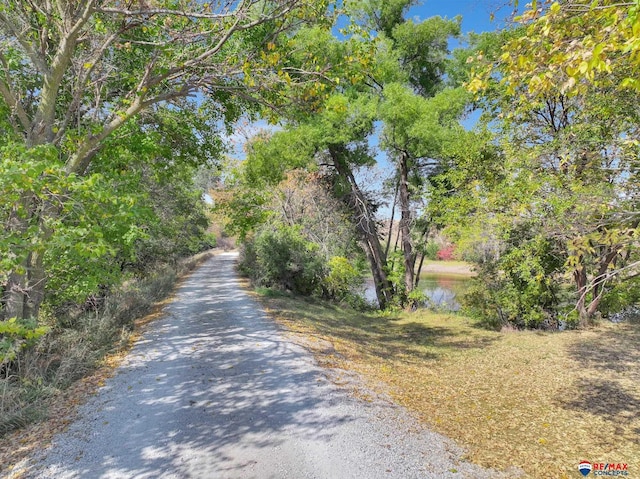 view of street with a water view