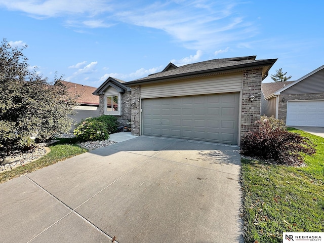 single story home featuring a garage