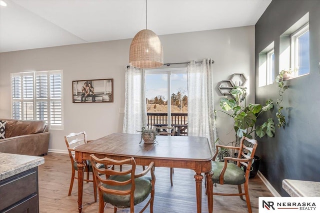 dining room with light wood-type flooring