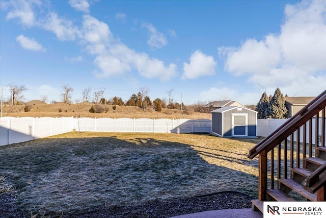 view of yard with a storage shed