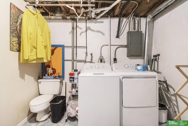 washroom with electric panel and independent washer and dryer