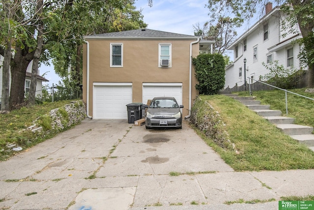 exterior space with a garage