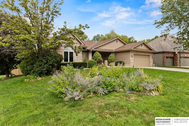 view of front facade featuring a front lawn and a garage