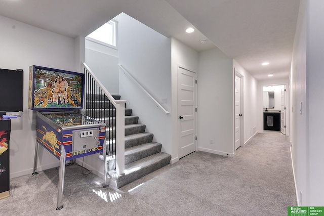 staircase with carpet flooring