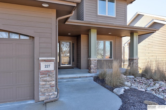 property entrance with a garage