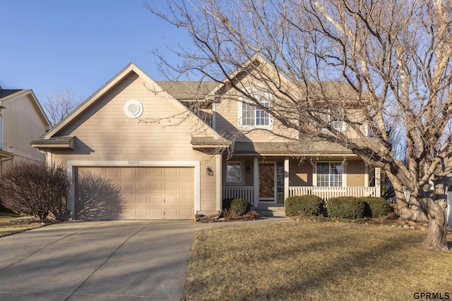 view of front facade with a front yard and covered porch