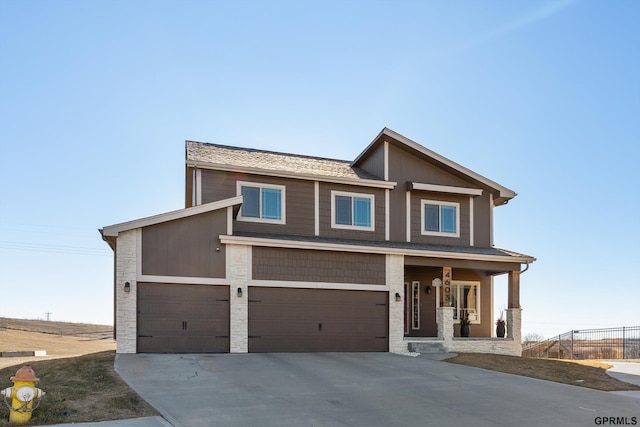 craftsman-style house featuring a garage