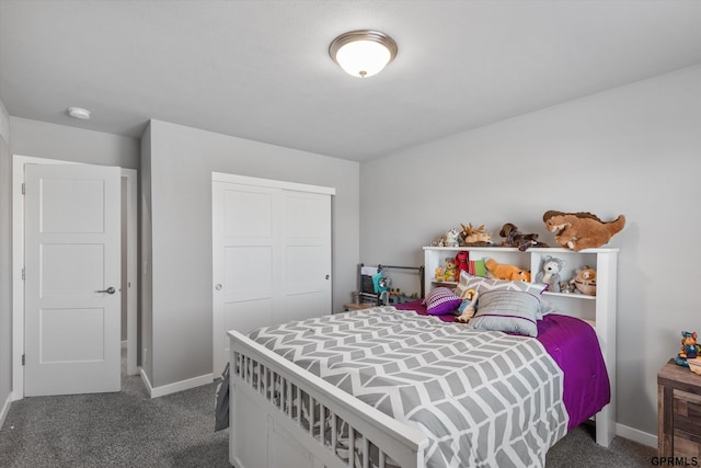 carpeted bedroom with a closet