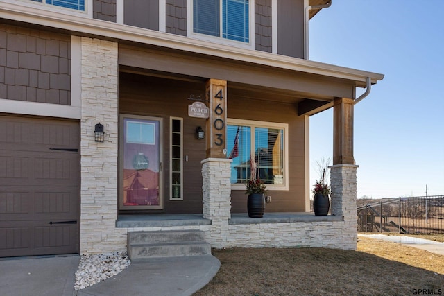 doorway to property with a porch