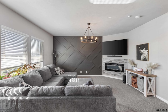 carpeted living room featuring a chandelier