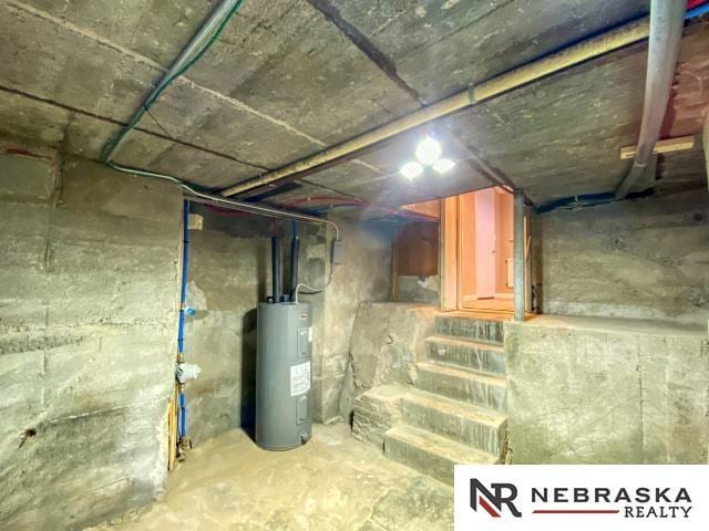 basement featuring electric water heater