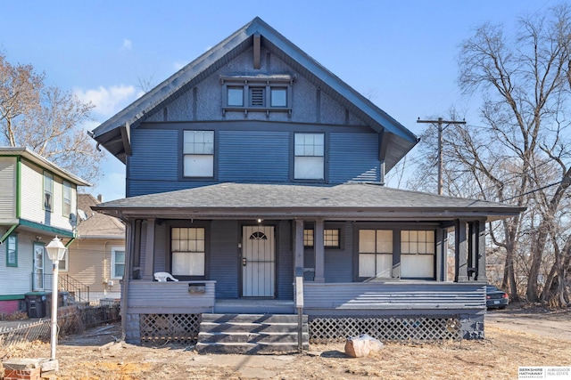 victorian house featuring covered porch