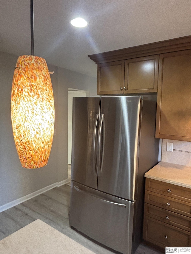 kitchen featuring stainless steel refrigerator