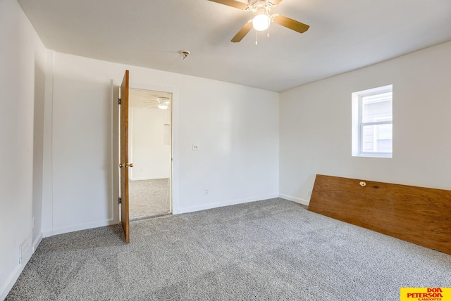 unfurnished room featuring carpet floors and ceiling fan