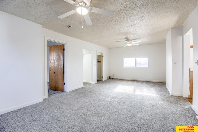 unfurnished bedroom with ceiling fan, a textured ceiling, and carpet flooring