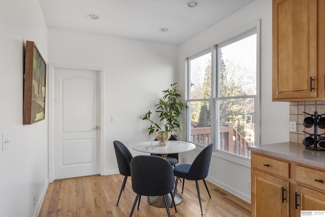 dining room featuring light hardwood / wood-style floors