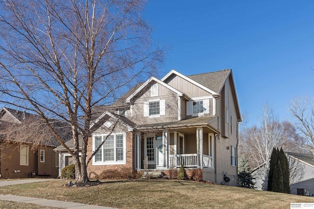 view of front of home featuring a porch and a front yard