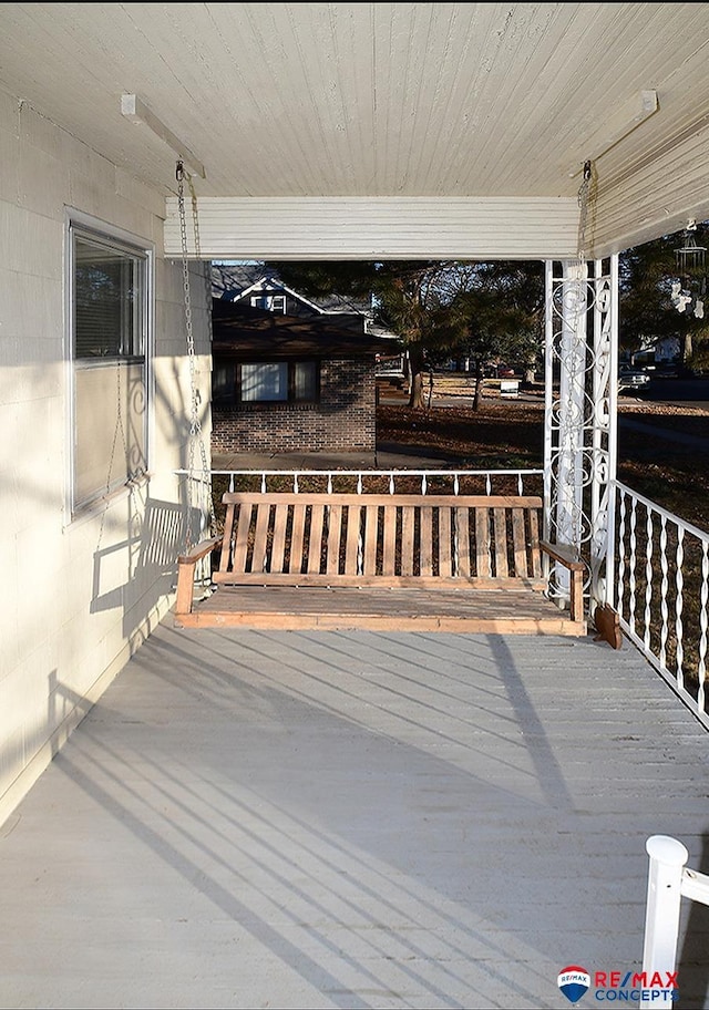 wooden deck featuring a porch