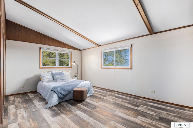 bedroom with dark hardwood / wood-style flooring and lofted ceiling with beams