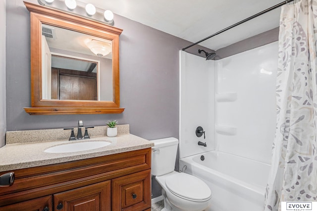 full bathroom featuring shower / tub combo with curtain, vanity, and toilet