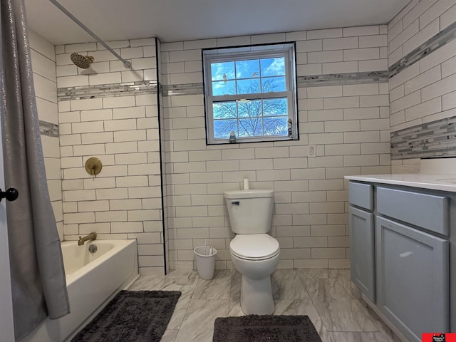 full bathroom featuring shower / tub combo, vanity, and toilet