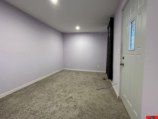 empty room with carpet flooring