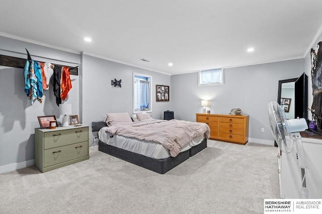 bedroom with crown molding and light carpet