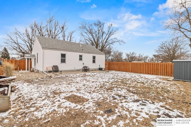 view of snow covered house