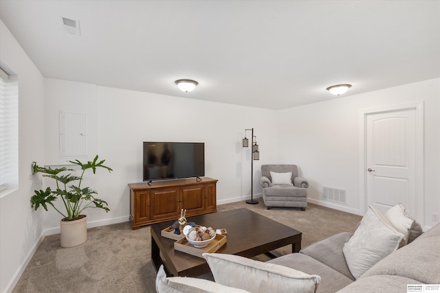 living room featuring light carpet