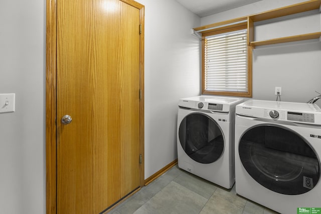 laundry room with separate washer and dryer