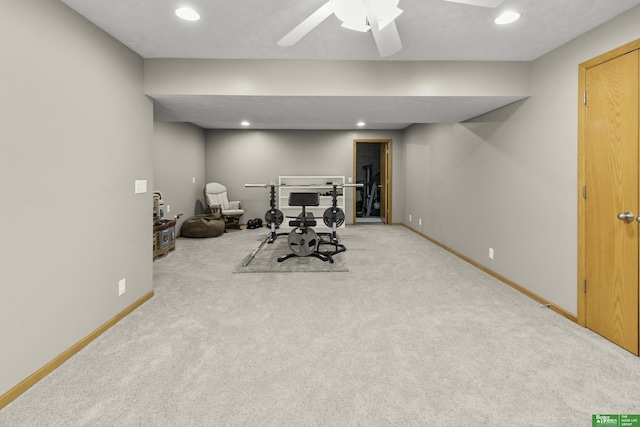 home office featuring ceiling fan and light carpet