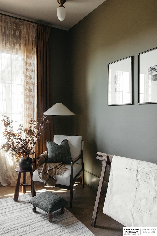 sitting room featuring hardwood / wood-style flooring