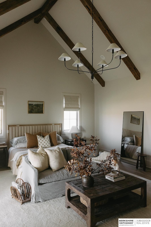 living room featuring high vaulted ceiling, an inviting chandelier, beam ceiling, and carpet