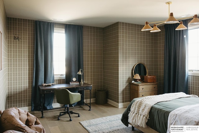 bedroom featuring light wood-type flooring