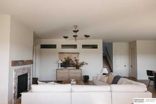 living room featuring a fireplace and hardwood / wood-style floors